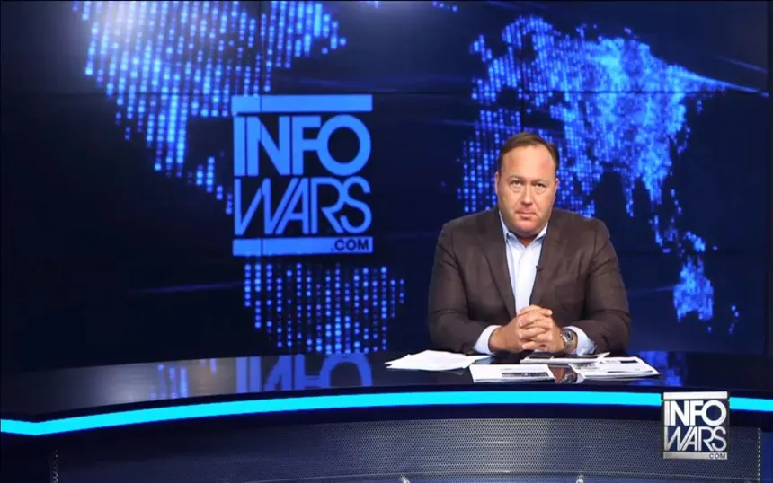 Infowars studio backdrop with Alex Jones